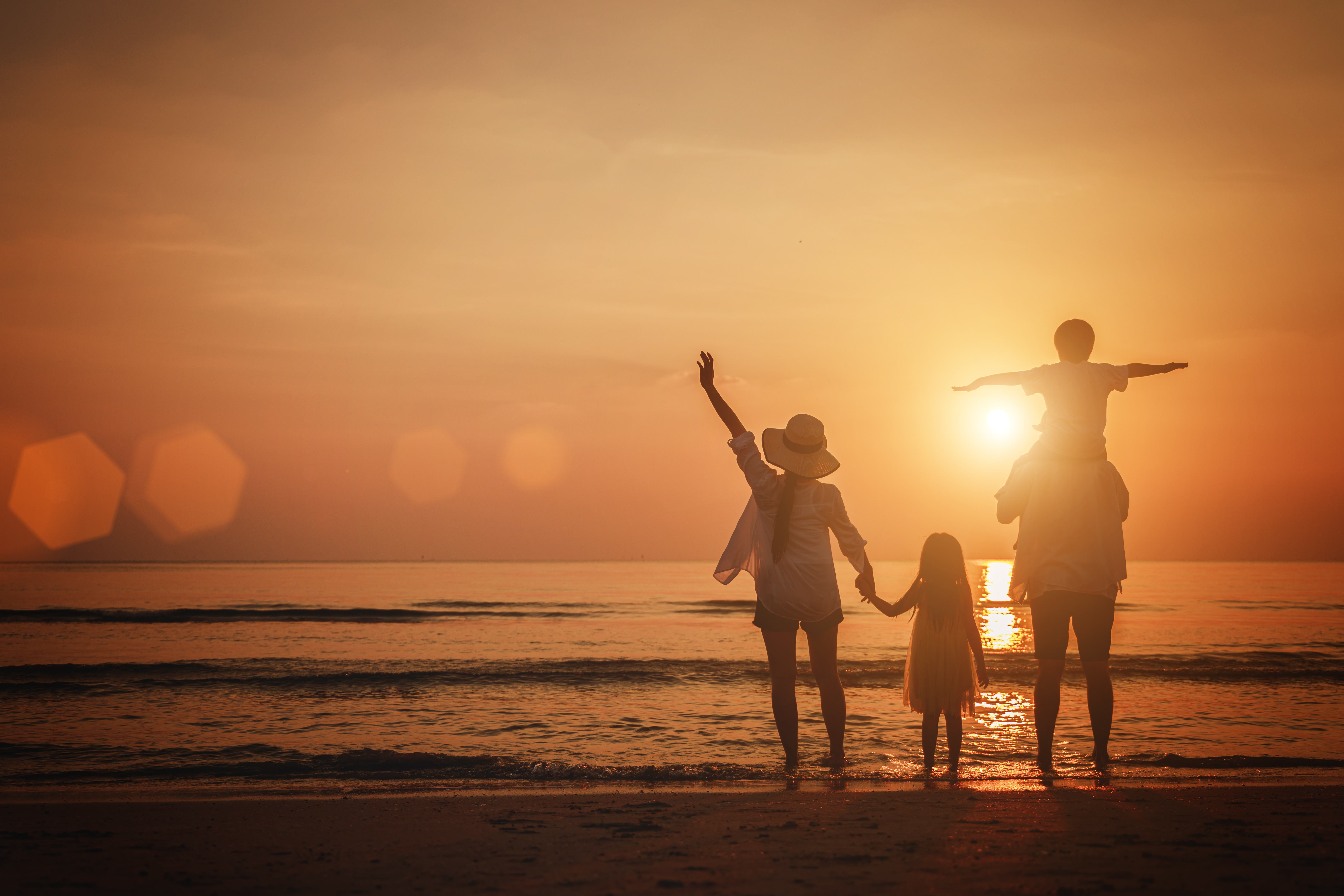 Family sunset on the beach